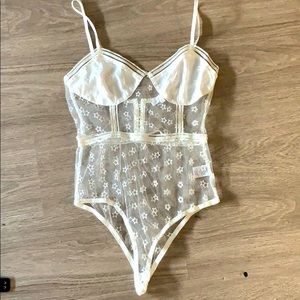 white mesh body suit